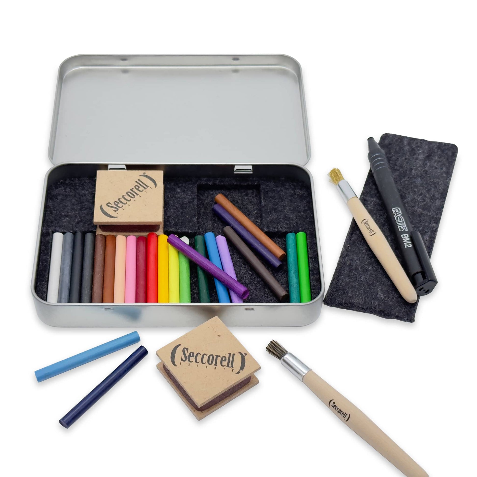 Contents of the Seccorell Studio large metal box - shows paint sticks, rubbing blocks, brushes and eraser pencil holders, ideal for versatile art projects