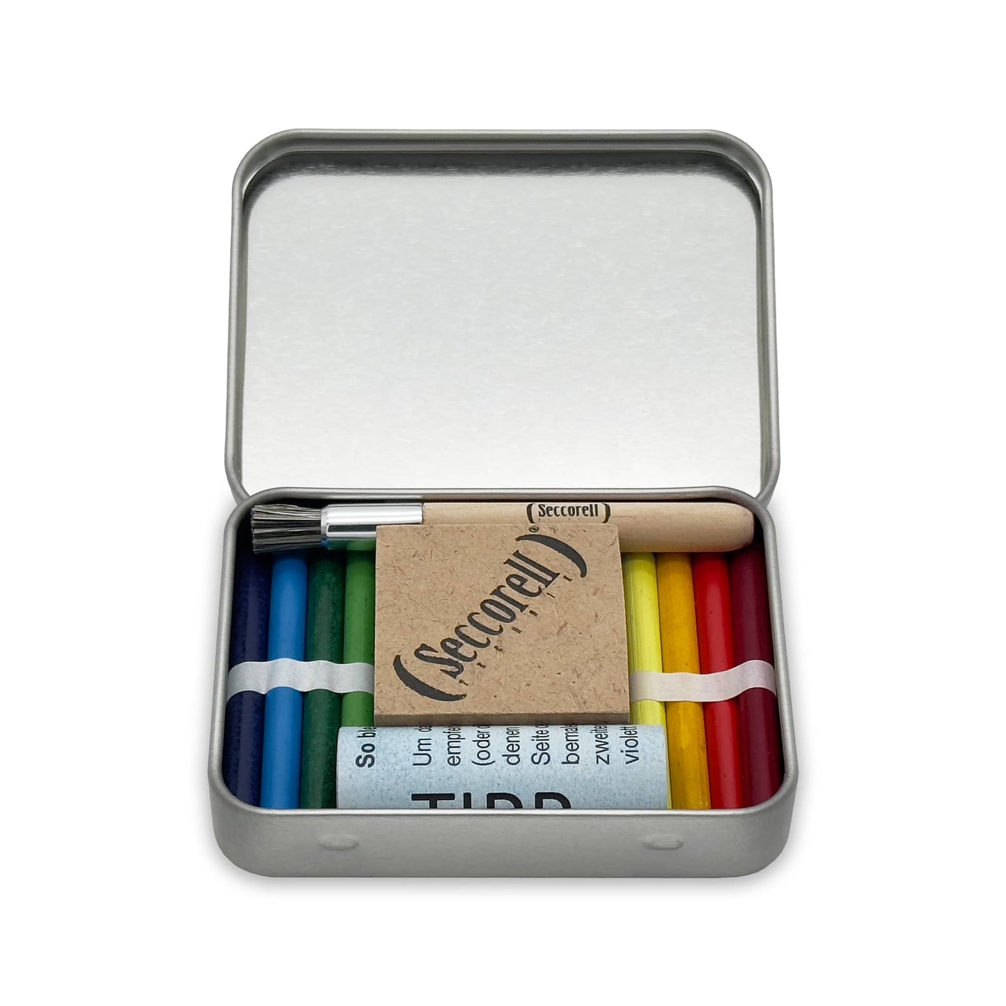 Seccorell Pocket "Hase" geöffnet, enthält 8 Farbstäbchen, einen Reibeblock, eine Reinigungsbürste und einen Radierer, verpackt in einer Metallbox, bereit für kunstvolles Schaffen.