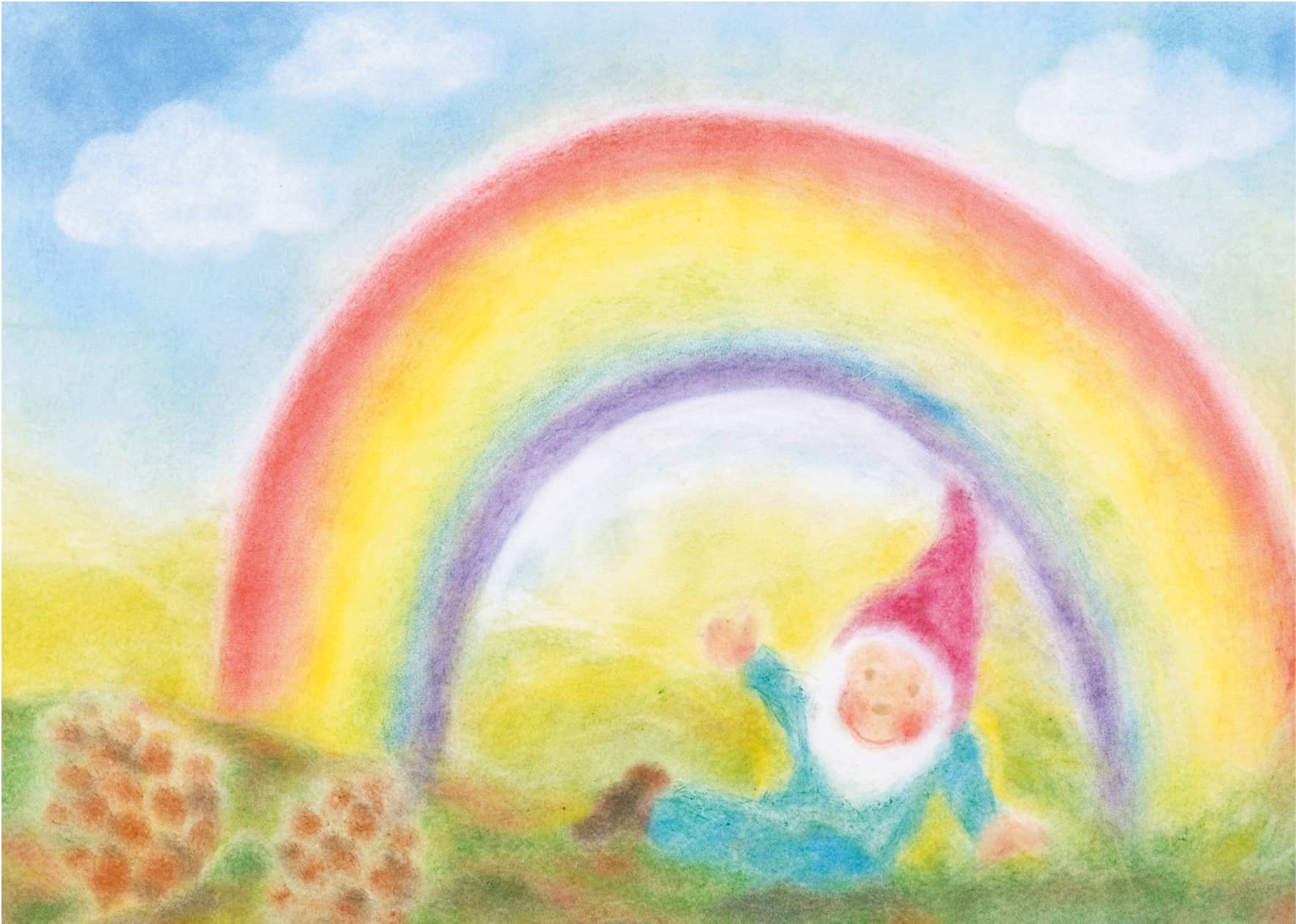 Seccorell Postkarte "Regenbogenzwerg" von Andrea Reiß – Illustration eines fröhlichen Zwerges unter einem leuchtenden Regenbogen in einer grünen Landschaft, gestaltet in Finger-Wischmaltechnik.